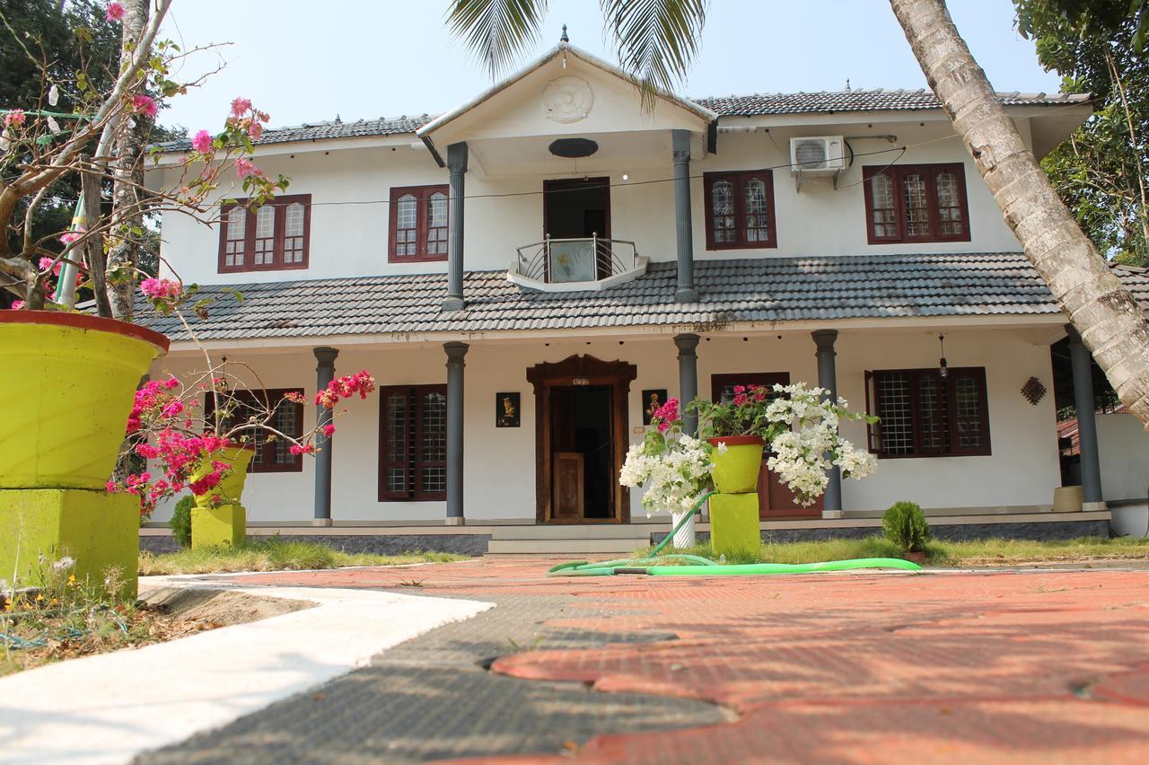 Апартаменты Marari Peterland Alappuzha Номер фото